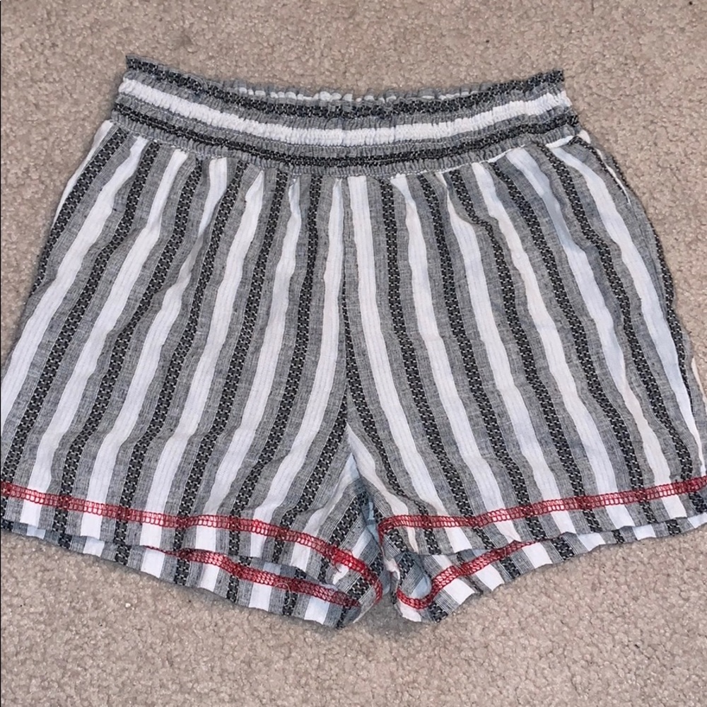 White and black striped shorts | red detailing